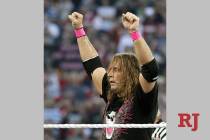 Bret "Hit Man" Hart celebrates his victory over Mr. McMahon at WrestleMania XXVI in Glendale, A ...