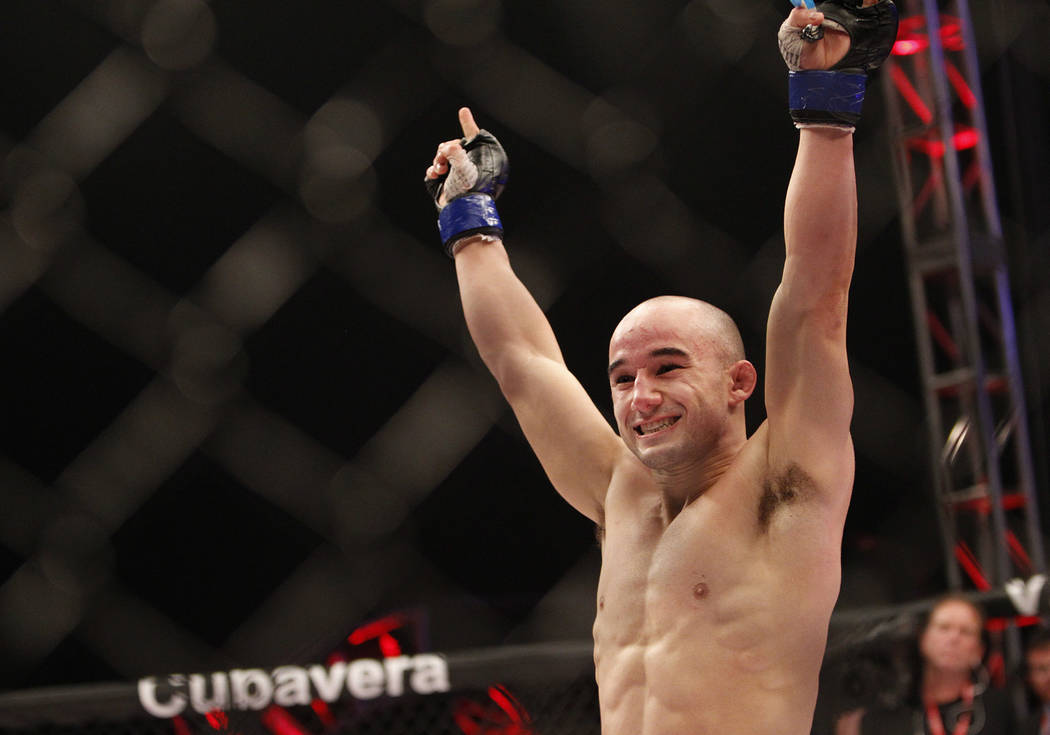 Marlon Moraes celebrates after defeating Miguel Torres during their World Series of Fighting ma ...