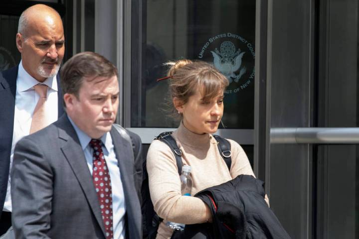 Actress Allison Mack leaves Brooklyn federal court Monday, April 8, 2019, in New York. Mack ple ...