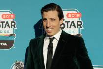 Vegas Golden Knights' Marc-Andre Fleury poses for photos before the Skills Competition for the ...