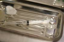 Health officials recommend vaccinations and hand washing to avoid contracting the flu. (Erik Ve ...