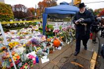 Rabbi Chuck Diamond arrives on the street corner outside the Tree of Life Synagogue Saturday, N ...