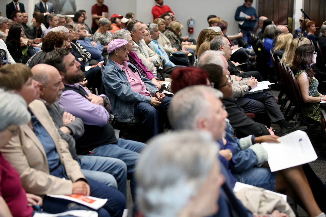 Audience members listen during a panel on anti-Semitism in America hosted by William S. Boyd Sc ...