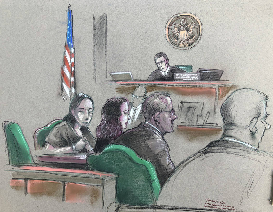 In this artist sketch, a Chinese woman, Yujing Zhang, left, listens to a hearing Monday, April ...