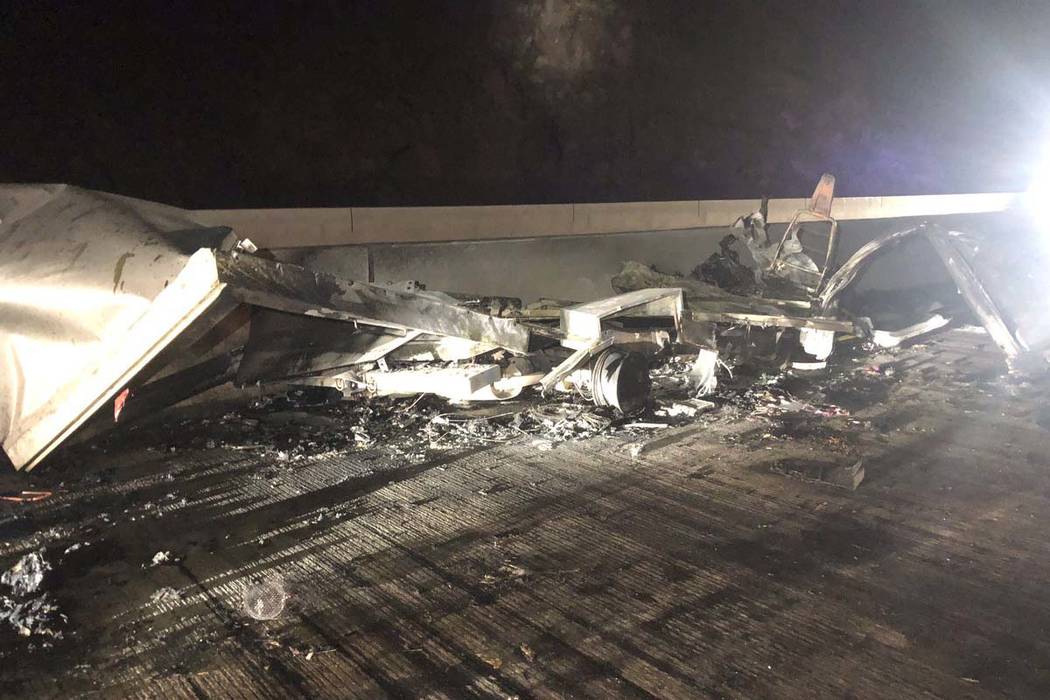 Debris lies on the roadway from a head-on crash between two vehicles near the Hoover Dam bypass ...