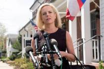 Homeland Security Secretary Kirstjen Nielsen talks outside her home in Alexandria, Va., on Mond ...