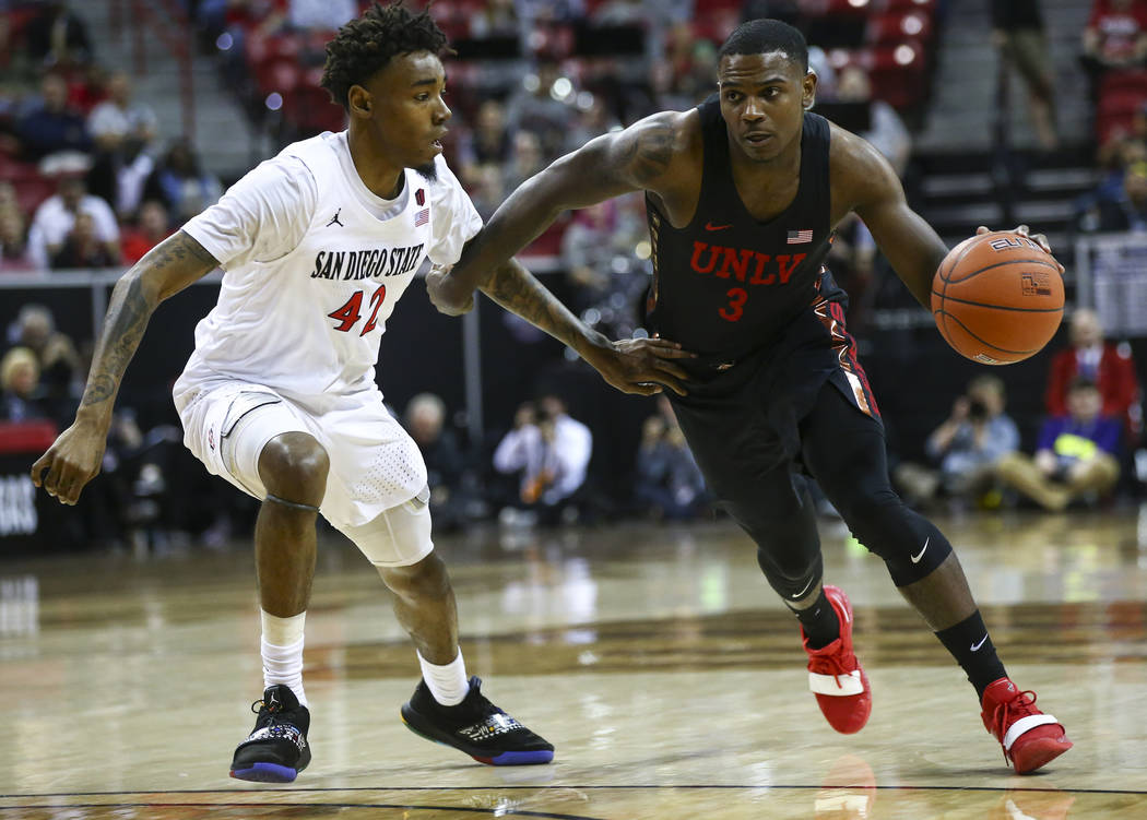 UNLV Rebels guard Amauri Hardy (3) brings the ball up court against San Diego State Aztecs guar ...