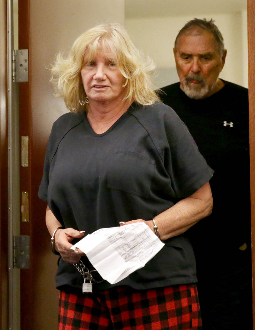 Patricia Chappuis, followed by her husband, Marcel, appear in court for a court hearing at the ...
