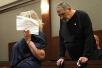 Patricia Chappuis, left, with her husband Marcel, appear in court for a court hearing at the Re ...