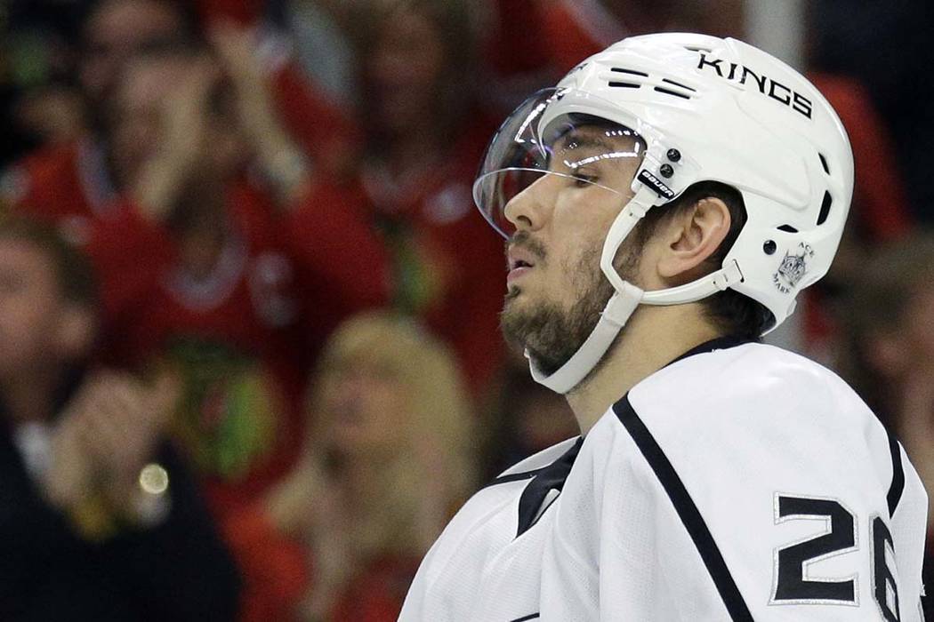 In this May 18, 2014, file photo, Los Angeles Kings' Slava Voynov (26) reacts after Chicago Bla ...