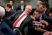 Rep. John Shimkus, R-Ill., speaks with an aide during a House and Senate conference on Capitol ...