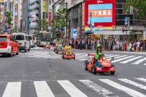 Participants compete in a "Mario Kart" race in Shibuya, Tokyo. (Getty Images_