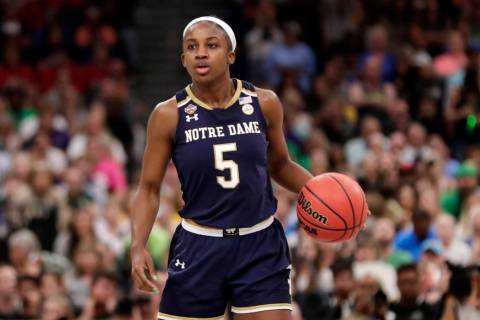 Notre Dame guard Jackie Young (5) dribbles the ball, during the second half of the Final Four c ...