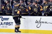 Vegas Golden Knights forward Brandon Pirri (73) gets fist bumps from teammates after scoring a ...