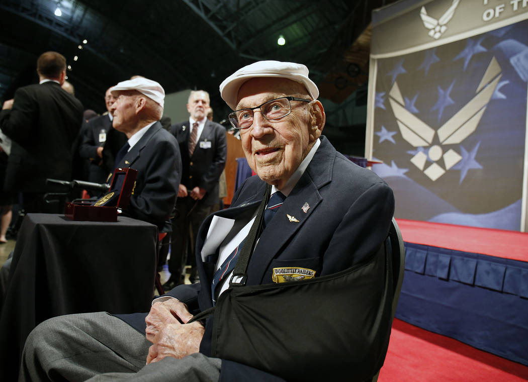 FILE - In this April 18, 2015, file photo, two members of the Doolittle Tokyo Raiders, retired ...