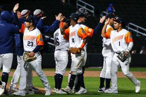 Las Vegas Aviators players celebrate a 10-2 win over the Sacramento River Cats in their home op ...