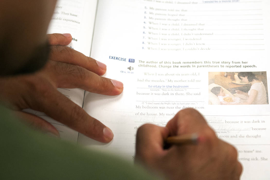 A College of Southern Nevada student completes various book exercises during his intermediate E ...