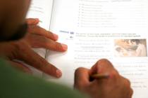 A College of Southern Nevada student completes various book exercises during his intermediate E ...