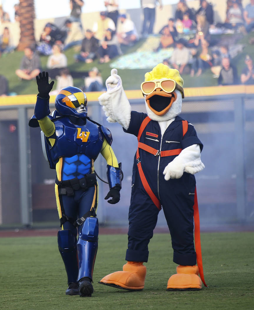 Mascot Spruce the Goose, right, introduces Mr. Aviator before the start of the Las Vegas Aviato ...