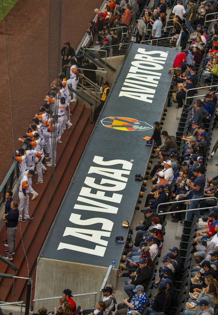 The team awaits on the rail before the Las Vegas Aviators home opener on Tuesday, April 9, 2019 ...