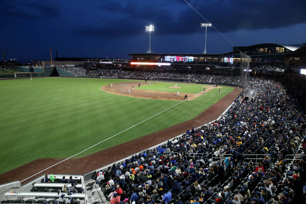 Fans watch the action on the first-ever opening night for the Las Vegas Aviators at Las Vegas B ...