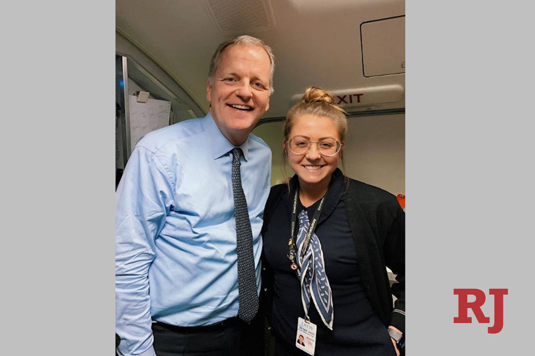 American Airlines CEO Doug Parker with flight attendant Maddie Peters (maddieryanee/Instagram)