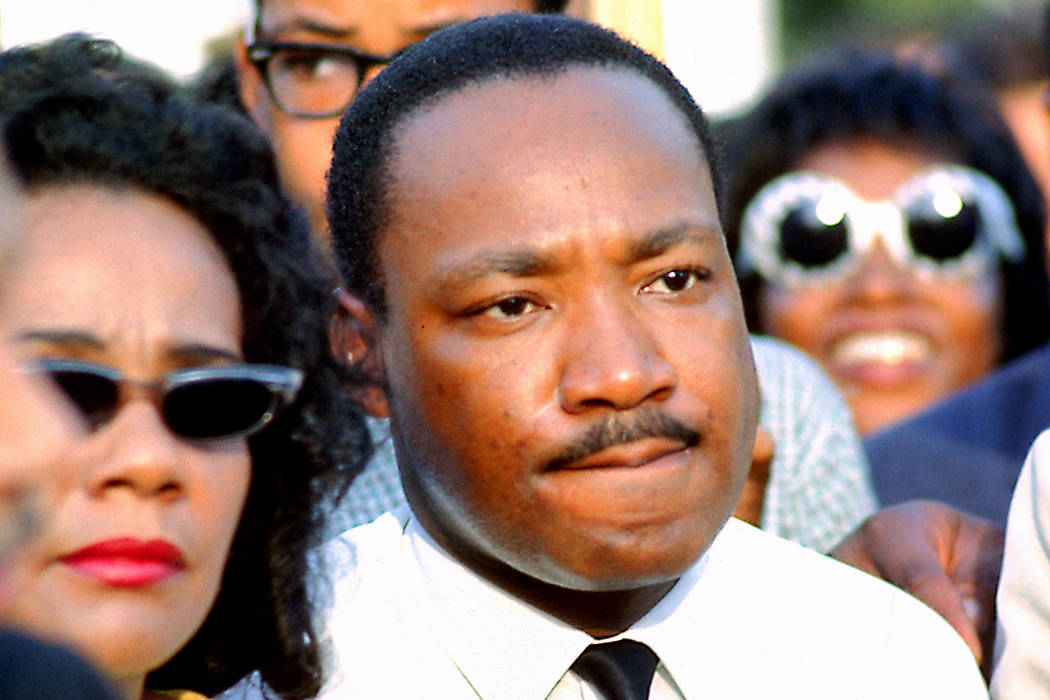 Martin Luther King Jr. and his wife, Coretta Scott King, are seen July 10, 1966, in Chicago's G ...