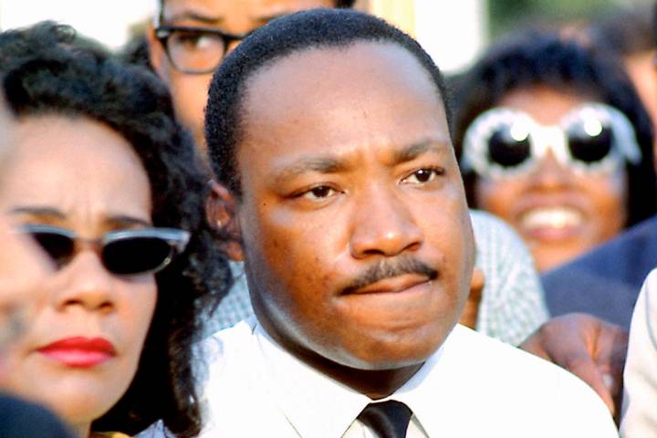 Martin Luther King Jr. and his wife, Coretta Scott King, are seen July 10, 1966, in Chicago's G ...