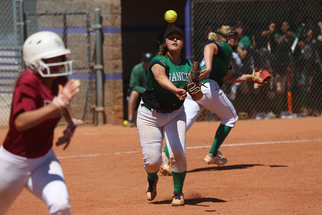 Rancho's Liliana Gutierrez (6) throws to first base for an out against Desert Oasis in the soft ...
