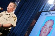 Assistant Clark County Sheriff Todd Fasulo shows a photo of Cody Leighland O'Bryan on Sept. 28, ...