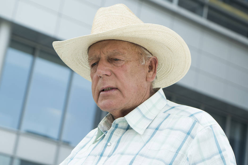 Cliven Bundy speaks with media outside the Lloyd George U.S. Courthouse after Scott Drexler's c ...