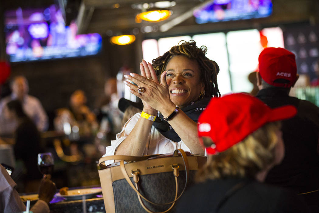 Las Vegas Aces fan Karmen Miller celebrates after Jackie Young of Notre Dame was selected as th ...