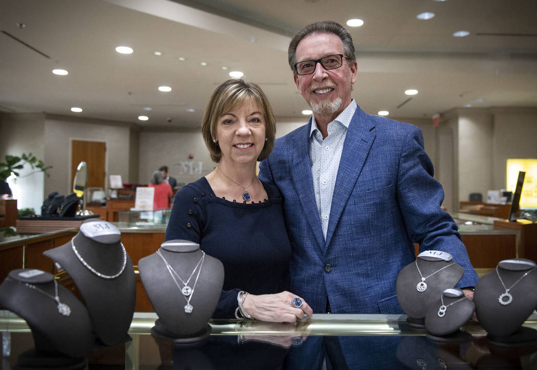 Owners Darlene and Cliff Miller pose for a portrait at the MJ Christensen Diamonds store in Las ...