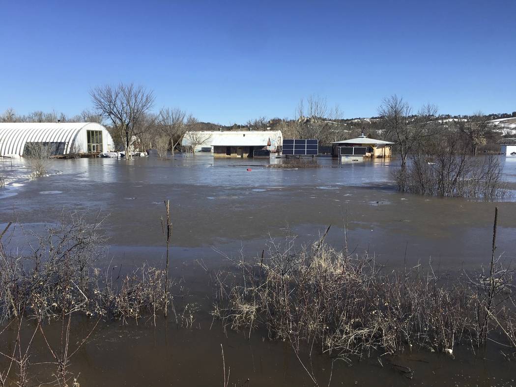 In this undated March 2019 photo provided by Henry Red Cloud, shows flooding on Cloud's Lakota ...