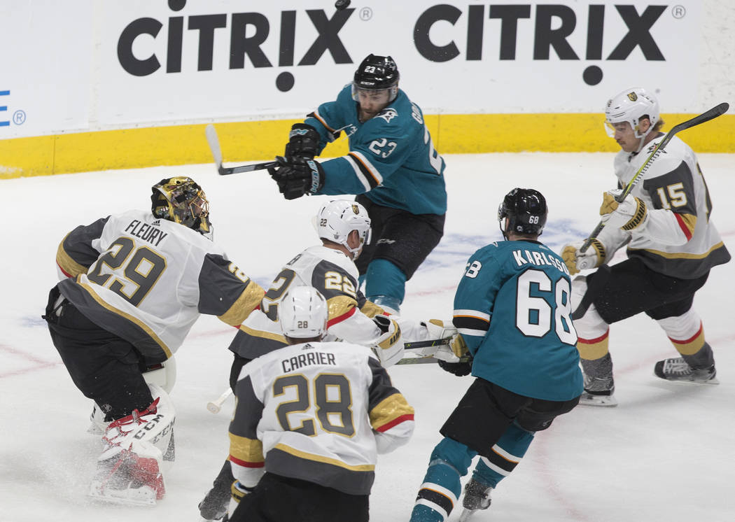 Golden Knights goaltender Marc-Andre Fleury (29) makes a save against San Jose Sharks right win ...