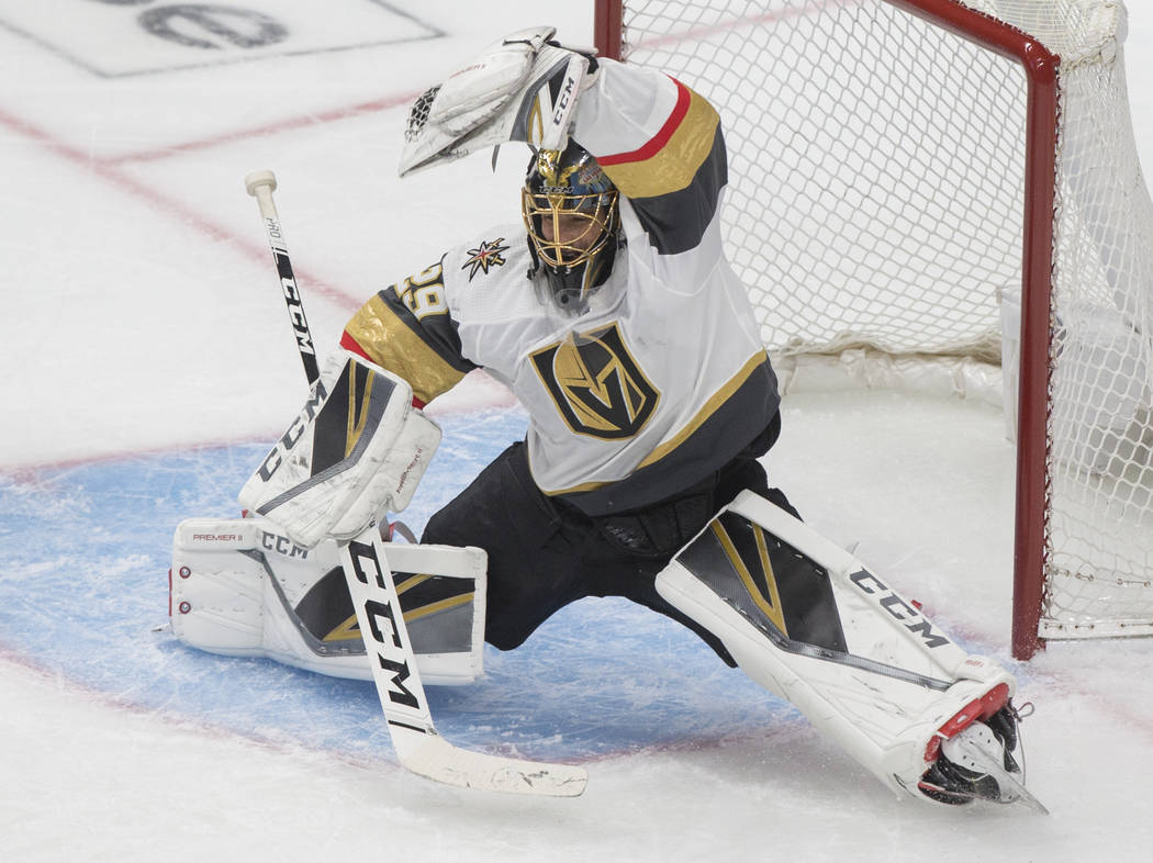 Golden Knights goaltender Marc-Andre Fleury (29) makes a save in the second period during Game ...