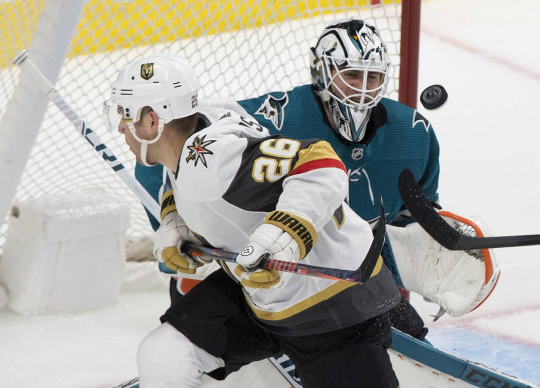 San Jose Sharks goaltender Martin Jones (31) makes a save against Golden Knights center Paul St ...