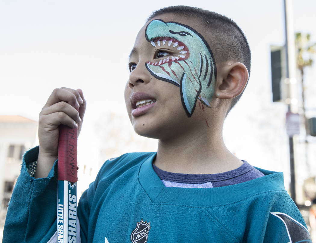 Sharks fan Gavin Nguyen, 7, outside the SAP Center before the start of game one of the NHL West ...