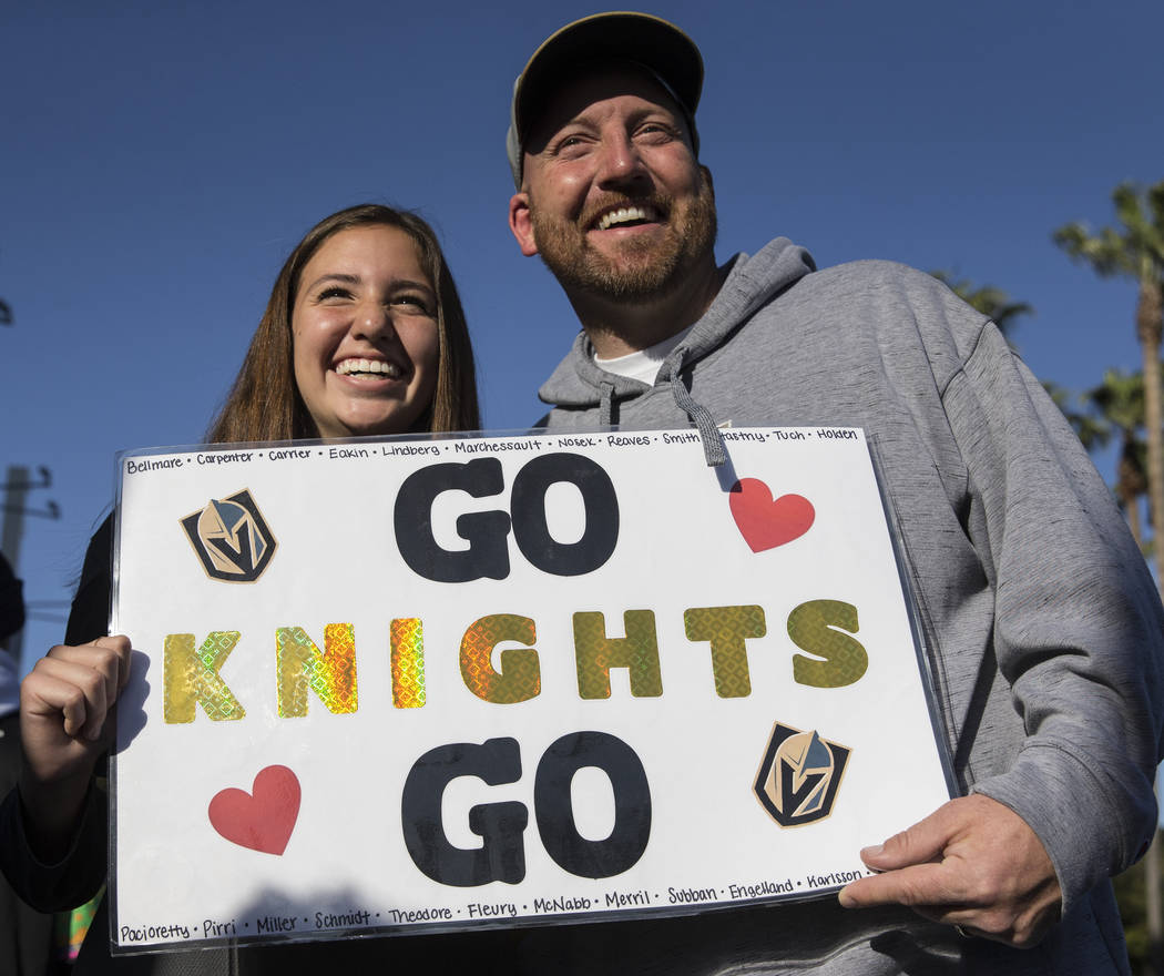 Golden Knights fans Kennedy Anderson, left, and dad Chris outside the SAP Center before the sta ...