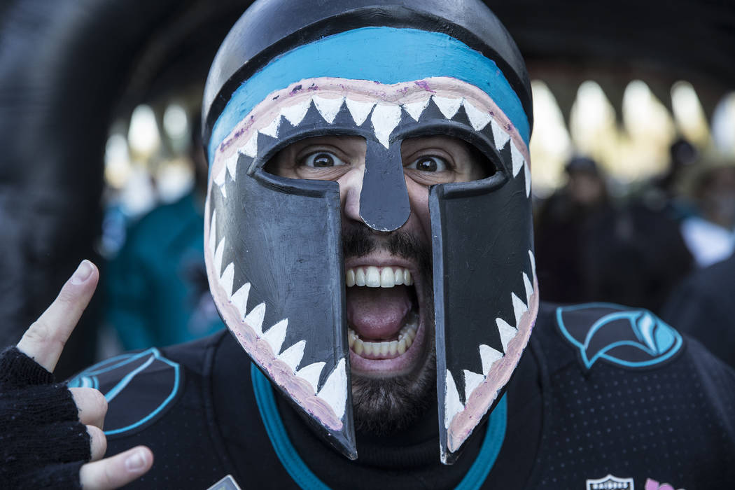 Sharks fan Rey Sanchez cheers for San Jose outside the SAP Center before the start of game one ...