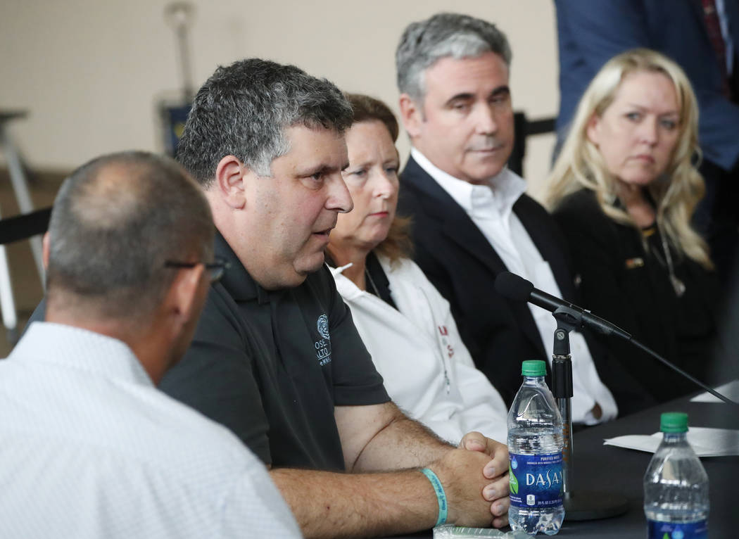 Parkland parent Tony Montalto, second from left, speaks as other relatives of victims look on d ...