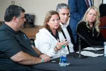 Debbie Hixon, second from left, who lost her husband Chris Hixon, athletic director at Stoneman ...