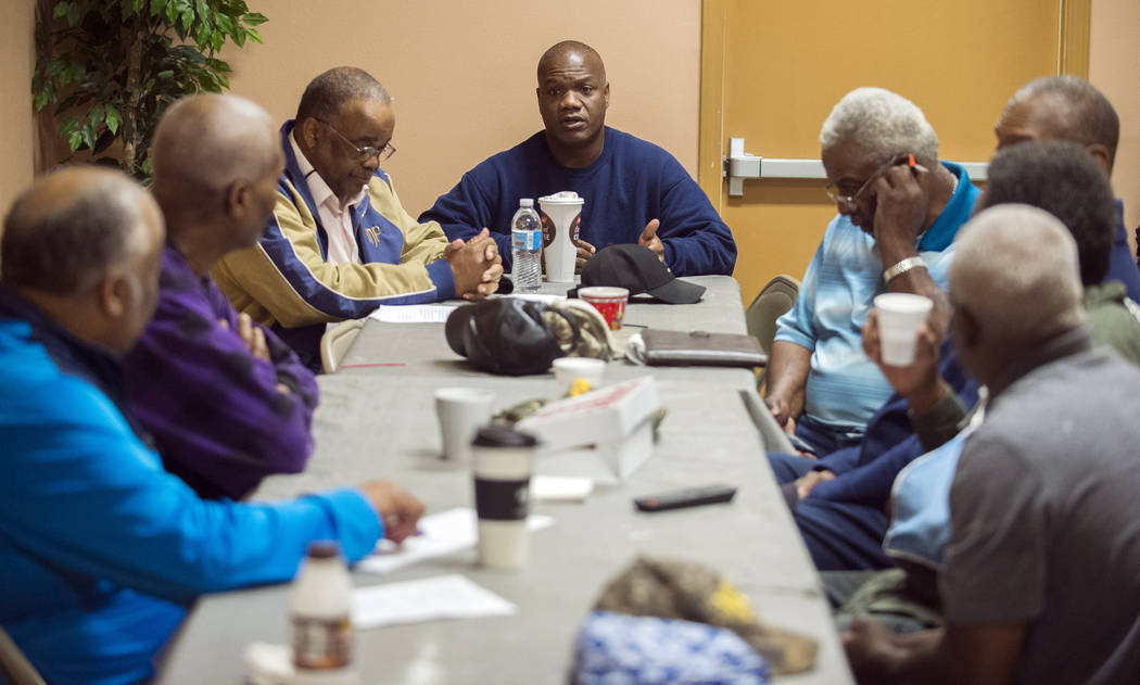 Rev. Kyle Sylvester, center, who pastor's St. Mary Missionary Baptist Church which was the firs ...