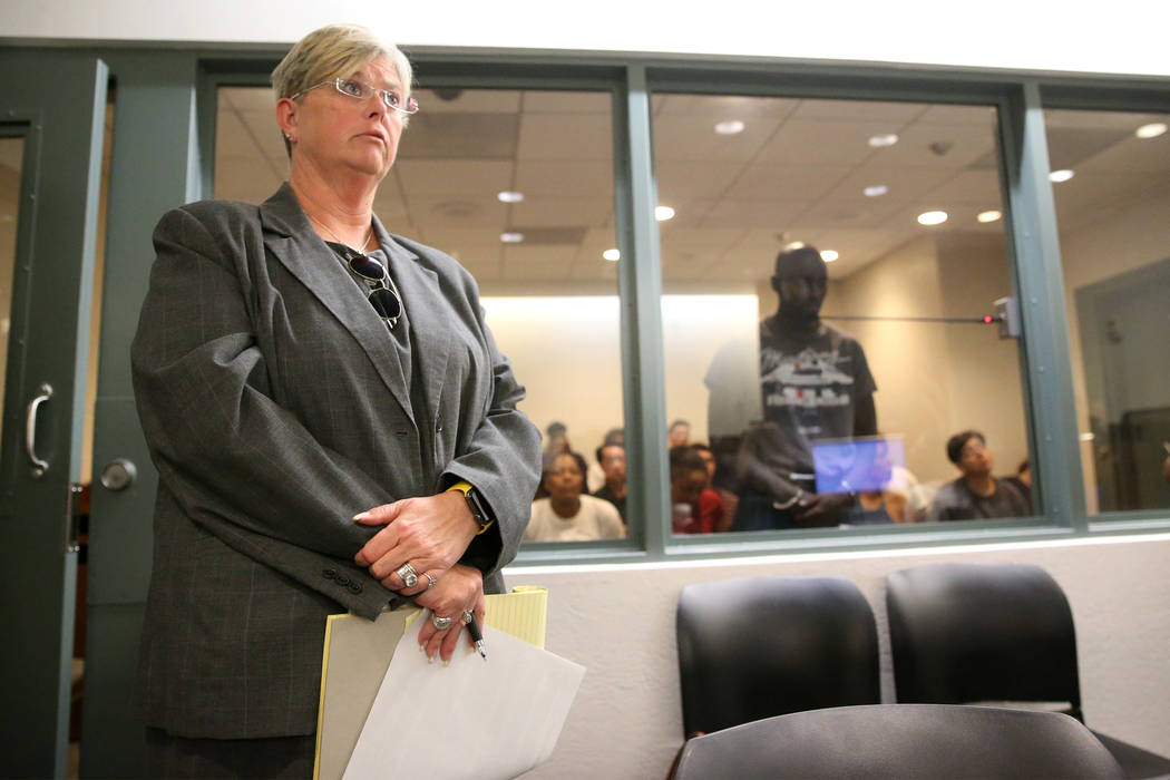Lauria Lynch-German, left, during the initial court appearance for her client, ex-NFL player Ci ...