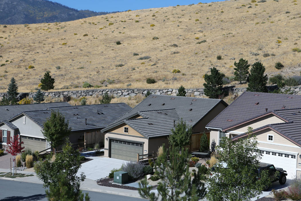 Stephen Paddock's home, center, sits empty in northwest Reno on Oct. 6, 2017. Cathleen Allison/ ...