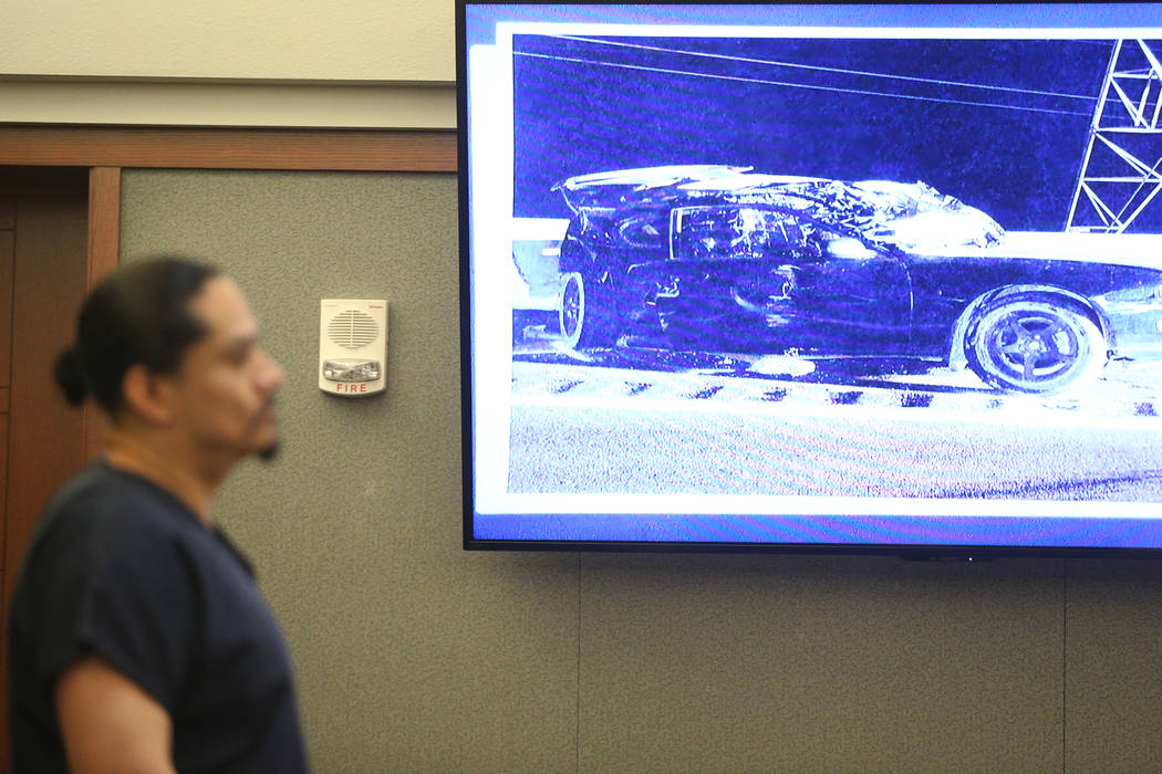 A photo of the victims's car is presented during the sentencing hearing for Antonio Macedo at t ...