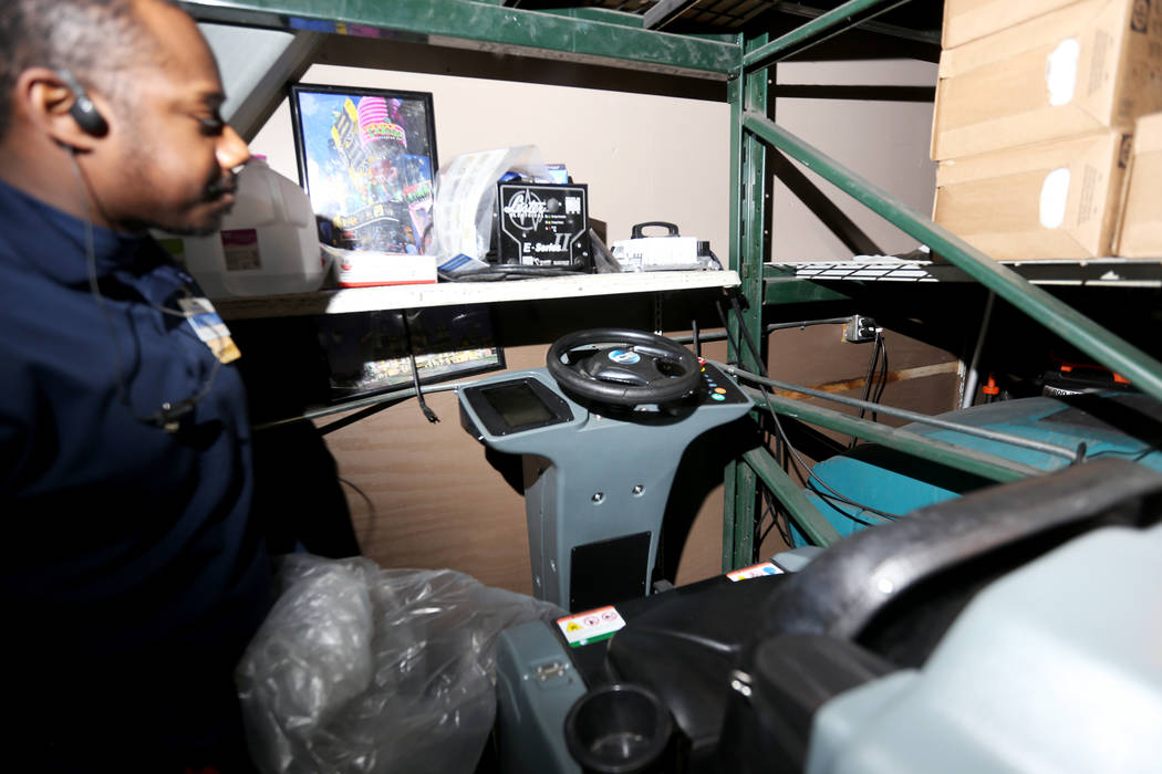 Co-manager Rio Bryant shows the Review-Journal the autonomous floor scrubber that the store use ...