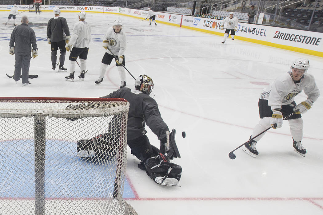 Golden Knights center Jonathan Marchessault (81) shoots on goaltender Malcolm Subban (30) durin ...