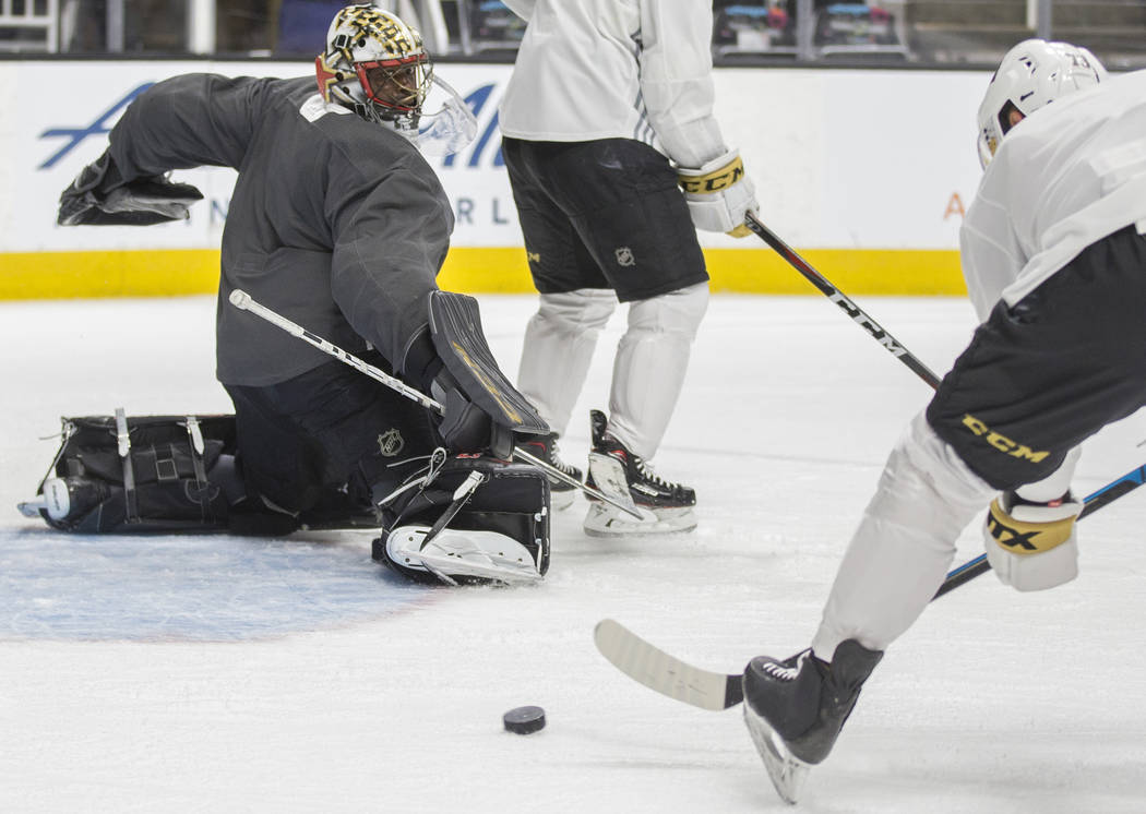 Golden Knights goaltender Malcolm Subban (30) makes a save during practice on Thursday, April 1 ...