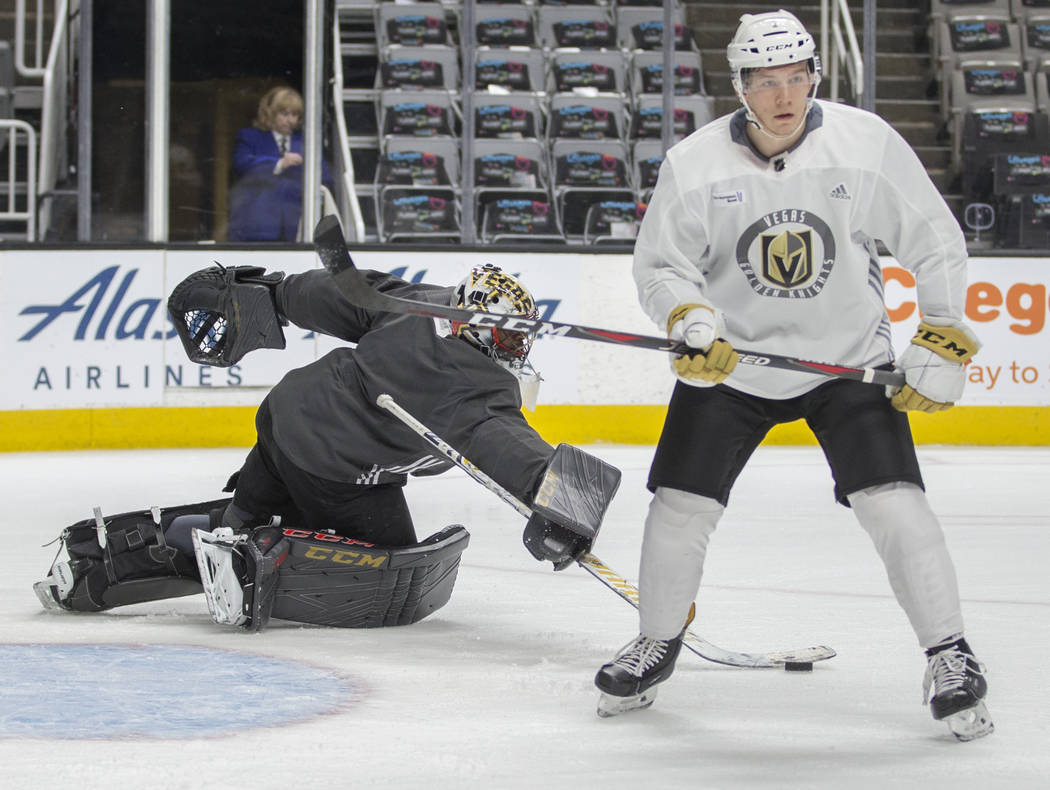 Golden Knights goaltender Malcolm Subban (30) makes a save during practice on Thursday, April 1 ...